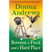 Between a Flock and a Hard Place: A Meg Langslow Mystery